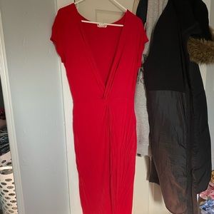 Long maxi dress with low cut neck and leg slit